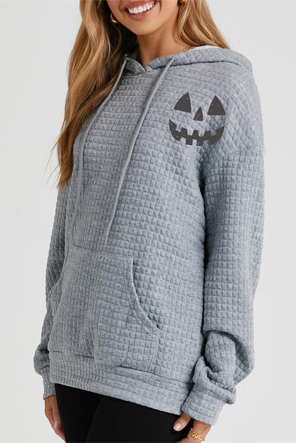 Autumn vibes pumpkin face graphic hoodie with pocket