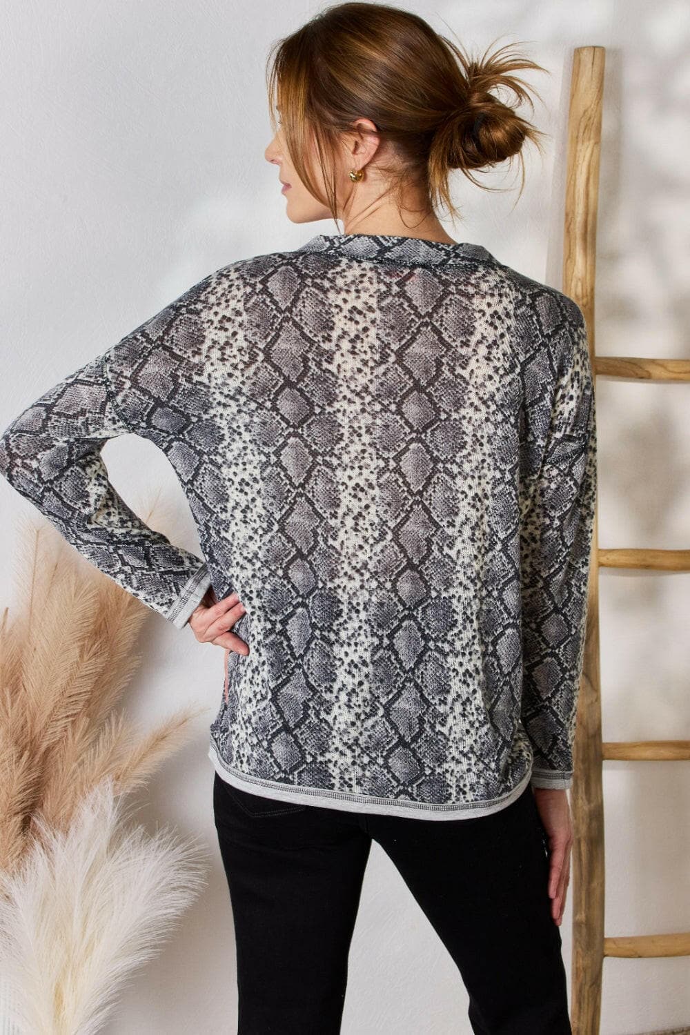 Hailey & Co Full Size Snakeskin V-Neck Long Sleeve TopStep Into the Spotlight with Hailey &amp; Co
 Embrace your boldness and stay on trend with the Hailey &amp; Co Full Size Snakeskin V-Neck Long Sleeve Top. This stunnLove Salve -Neck Long Sleeve Topcloseout