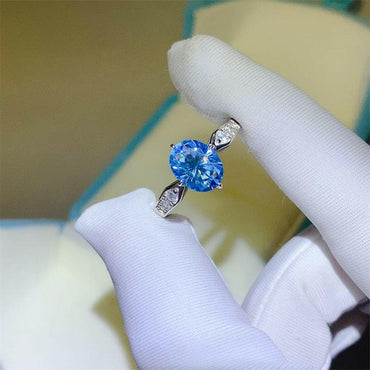 2 Carat Moissanite Sterling Silver Ring with Zircon Detail.