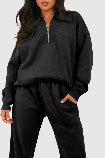 Chic black half zip tracksuit with ribbed edges for ultimate comfort