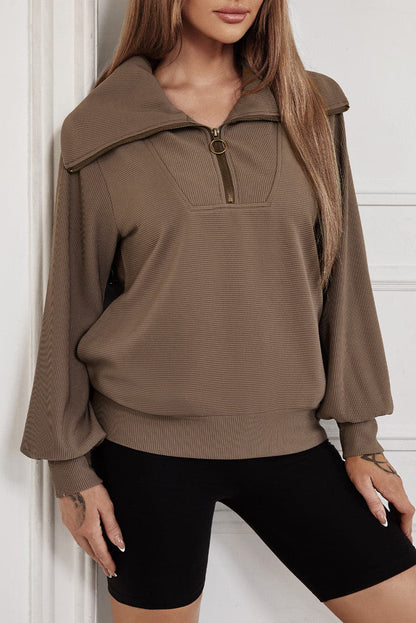 Pocketed Quarter Zip Collared Neck Sweatshirt.