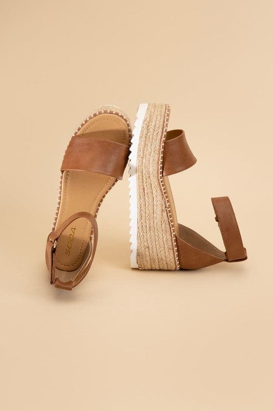 TUCKIN-S Platform Sandals.