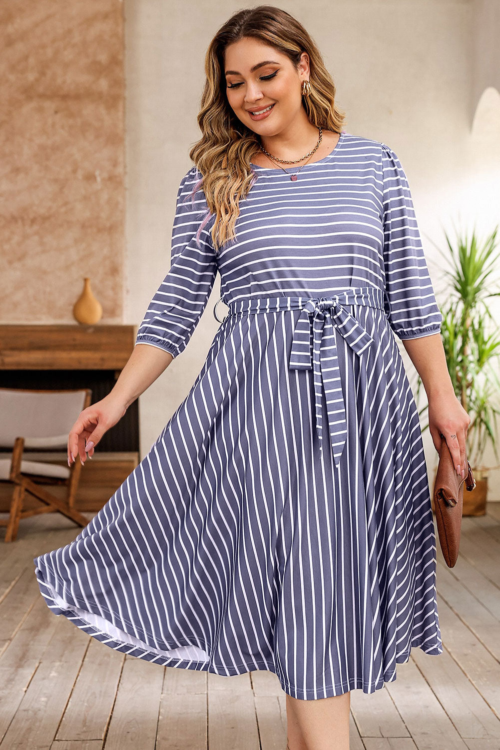 Chic gray striped plus size dress with tie waist and 3/4 sleeves