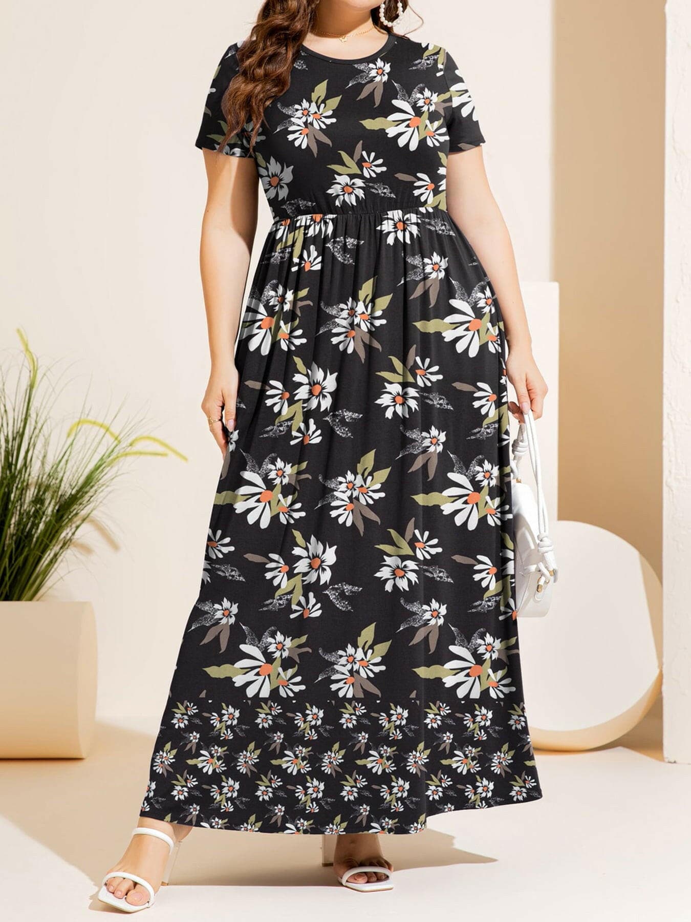 Plus Size Printed Round Neck Short Sleeve Maxi DressUpgrade Your Style with our Plus Size Printed Maxi Dress
 
 
Pattern Type: Eye-catching prints for a trendy look
 
Style: Effortlessly casual, perfect for various ocLove Salve Size Printed Round Neck Short Sleeve Maxi Dressplus