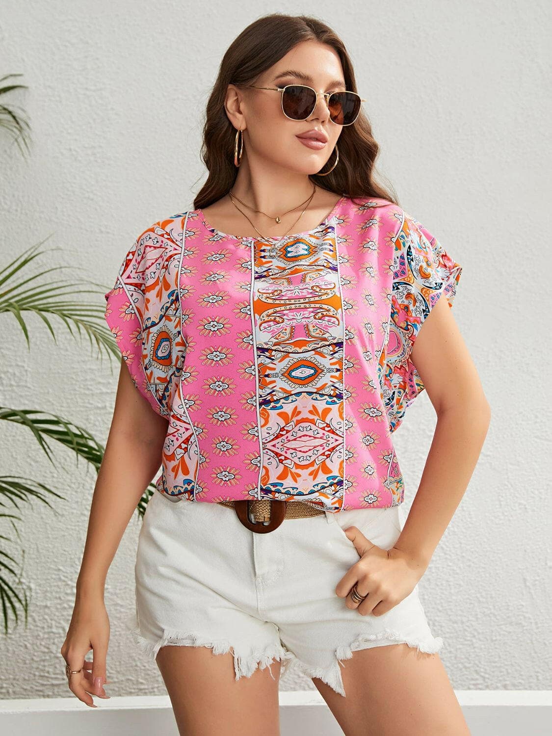 Plus Size Printed Round Neck BlousePlus Size Printed Round Neck Blouse
 Step up your style game with our Plus Size Printed Round Neck Blouse, a versatile piece perfect for both vacation and casual outLove Salve Size Printed Round Neck Blouseplus