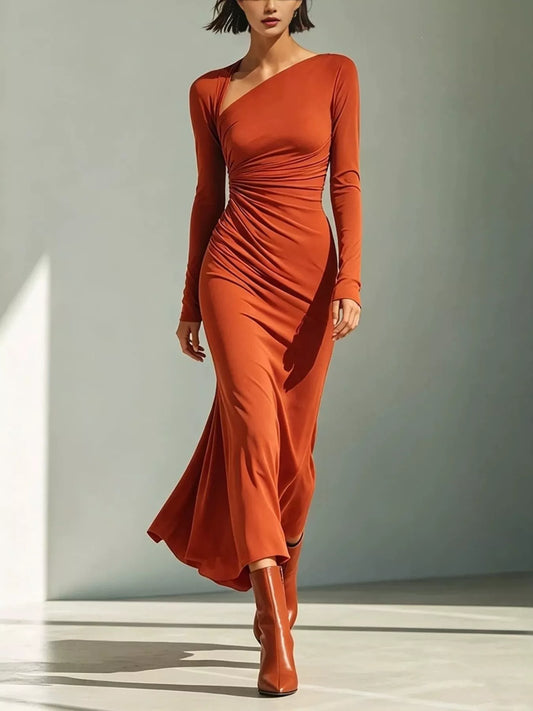 Woman wearing midi length orange dress.