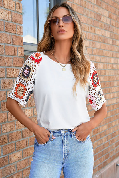 Elegant white floral crochet top with short sleeves