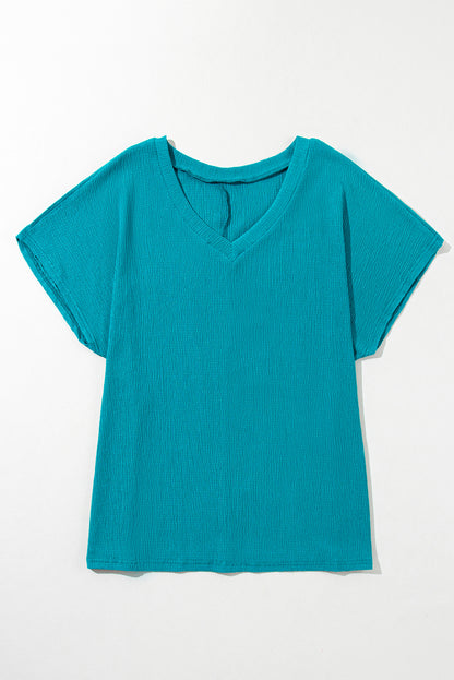 Chic blue sapphire textured v-neck plus size top with bubble hem