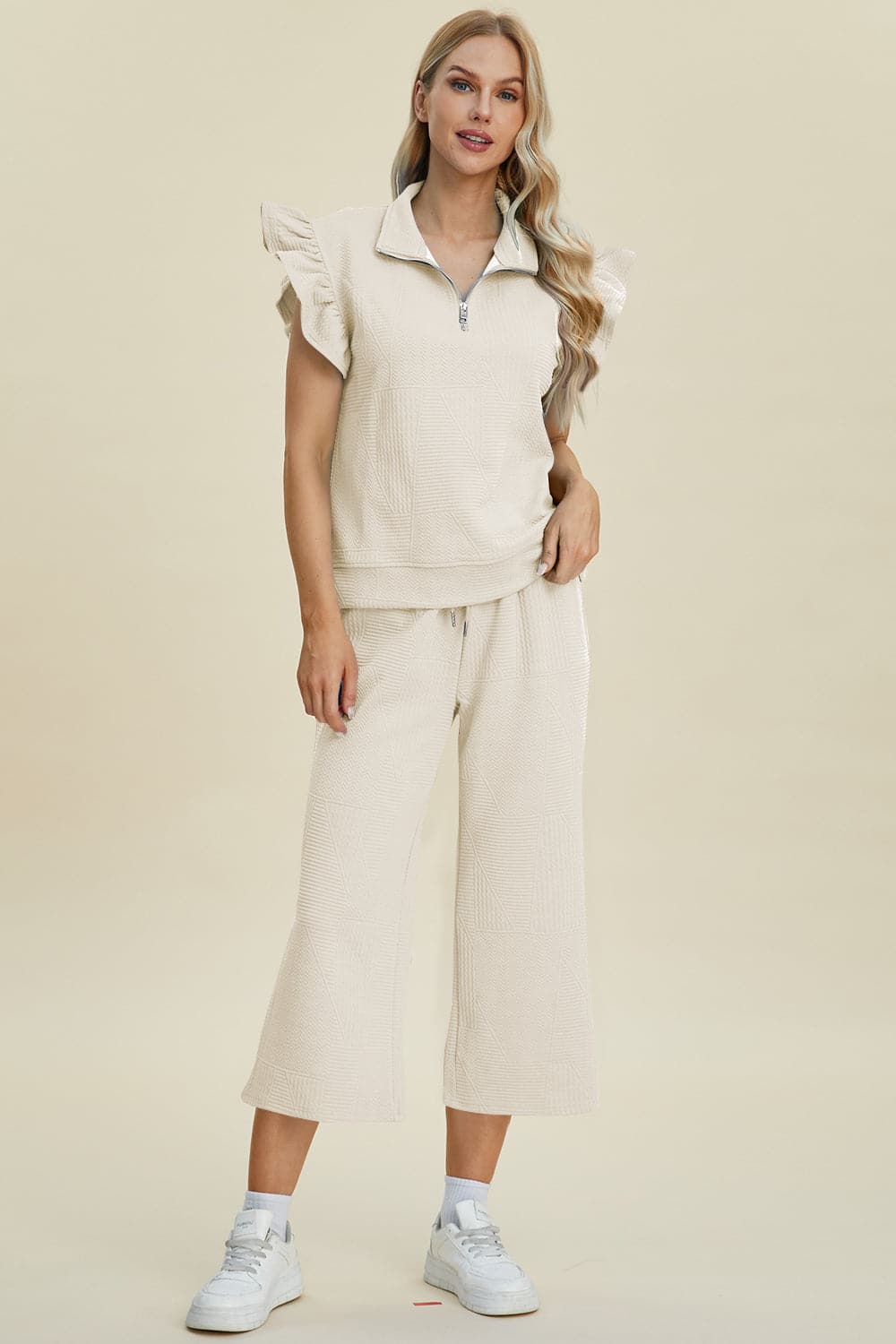 Double Take Full Size Texture Ruffle Short Sleeve Top and Wide Leg Pants Set.