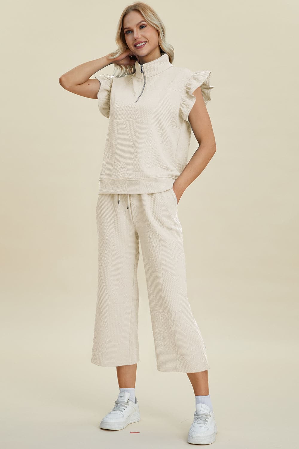 Double Take Full Size Texture Ruffle Short Sleeve Top and Wide Leg Pants Set.