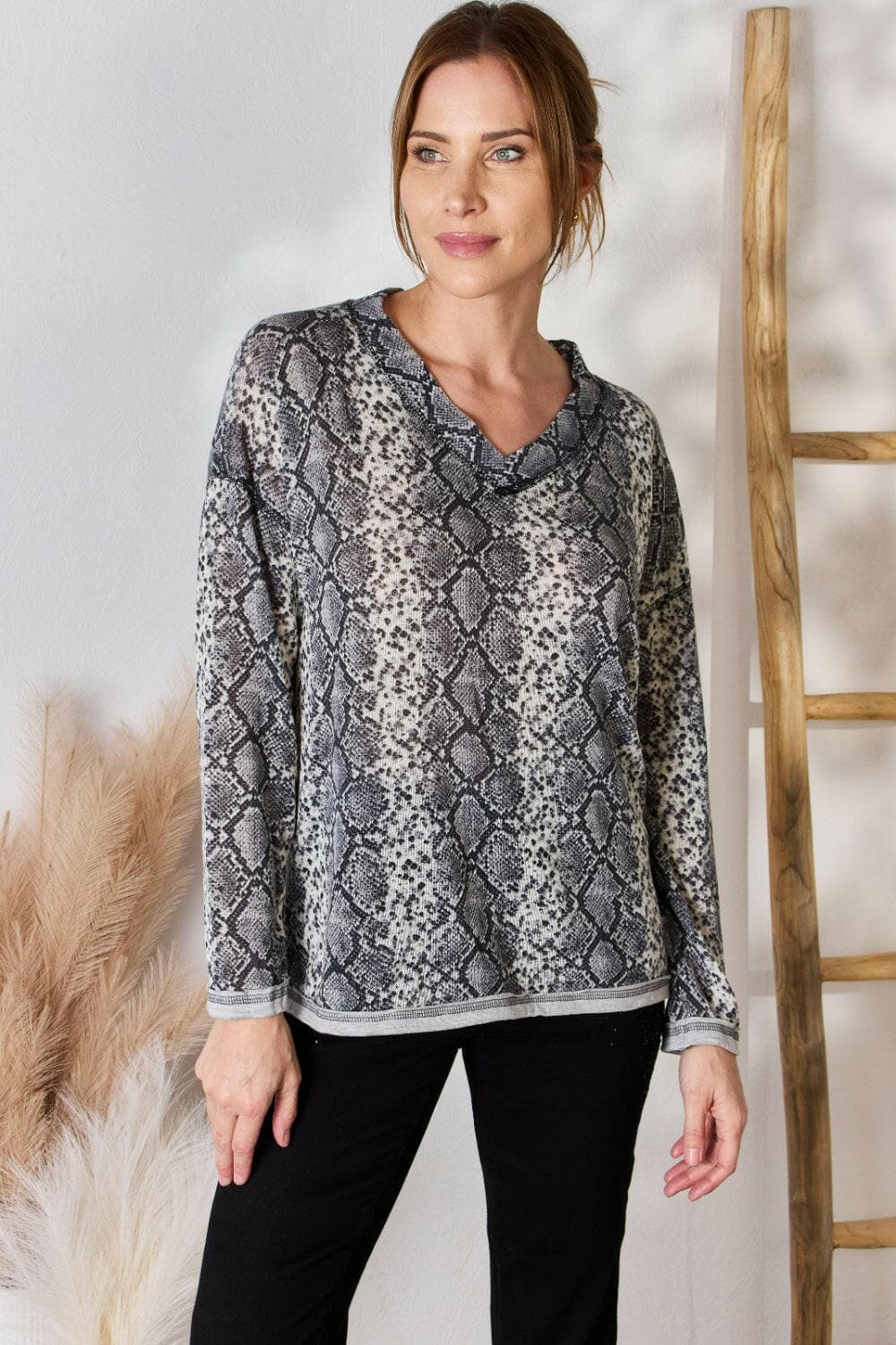 Hailey & Co Full Size Snakeskin V-Neck Long Sleeve TopStep Into the Spotlight with Hailey &amp; Co
 Embrace your boldness and stay on trend with the Hailey &amp; Co Full Size Snakeskin V-Neck Long Sleeve Top. This stunnLove Salve -Neck Long Sleeve Topcloseout