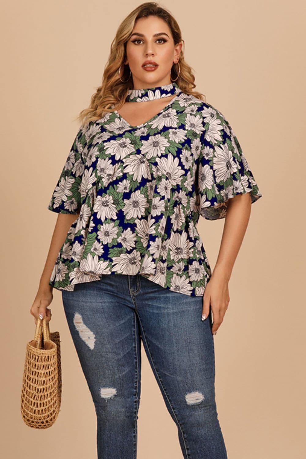 Plus Size Floral Flutter Sleeve Cutout Blouse.