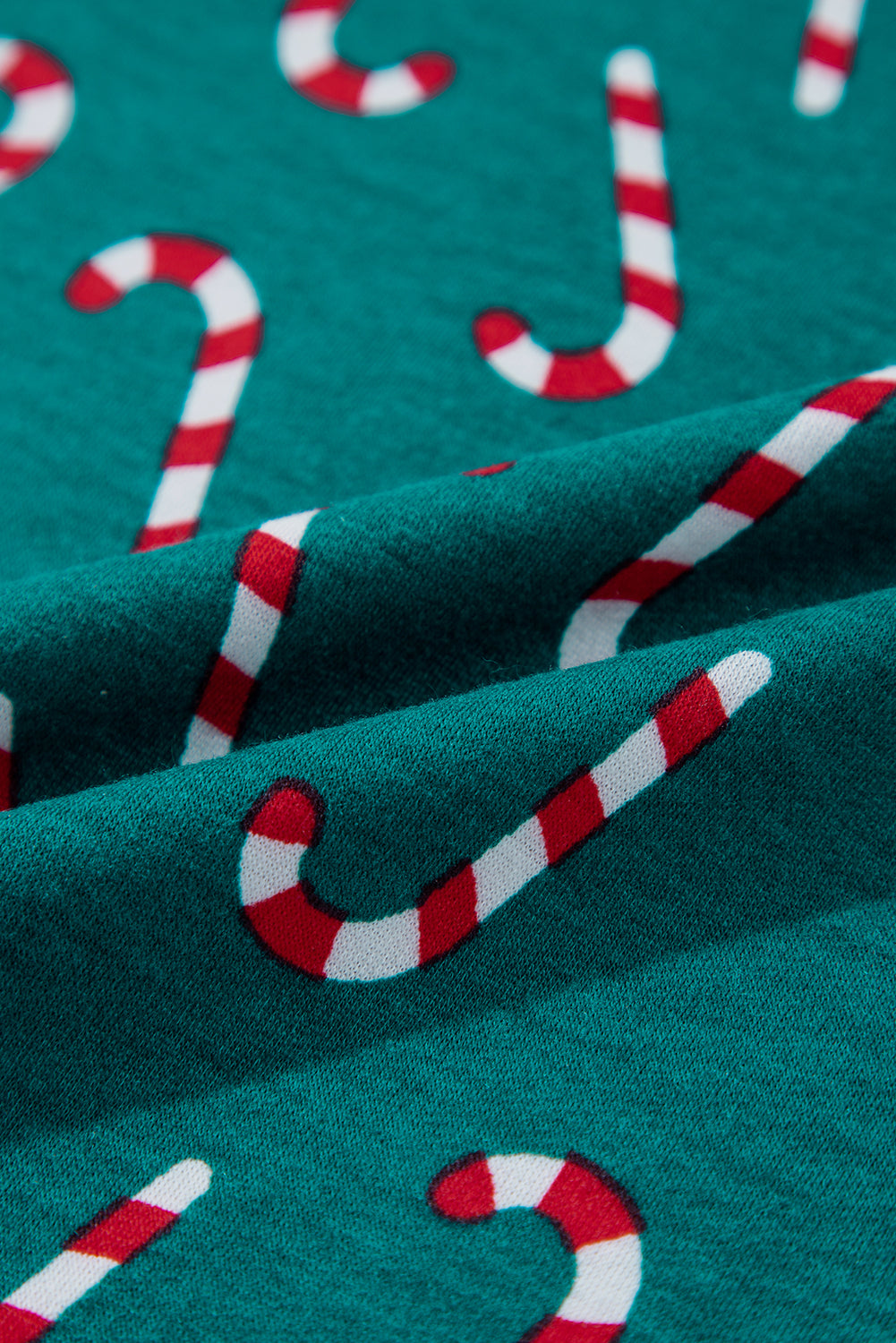 Festive green candy cane lounge set with stylish knot detail