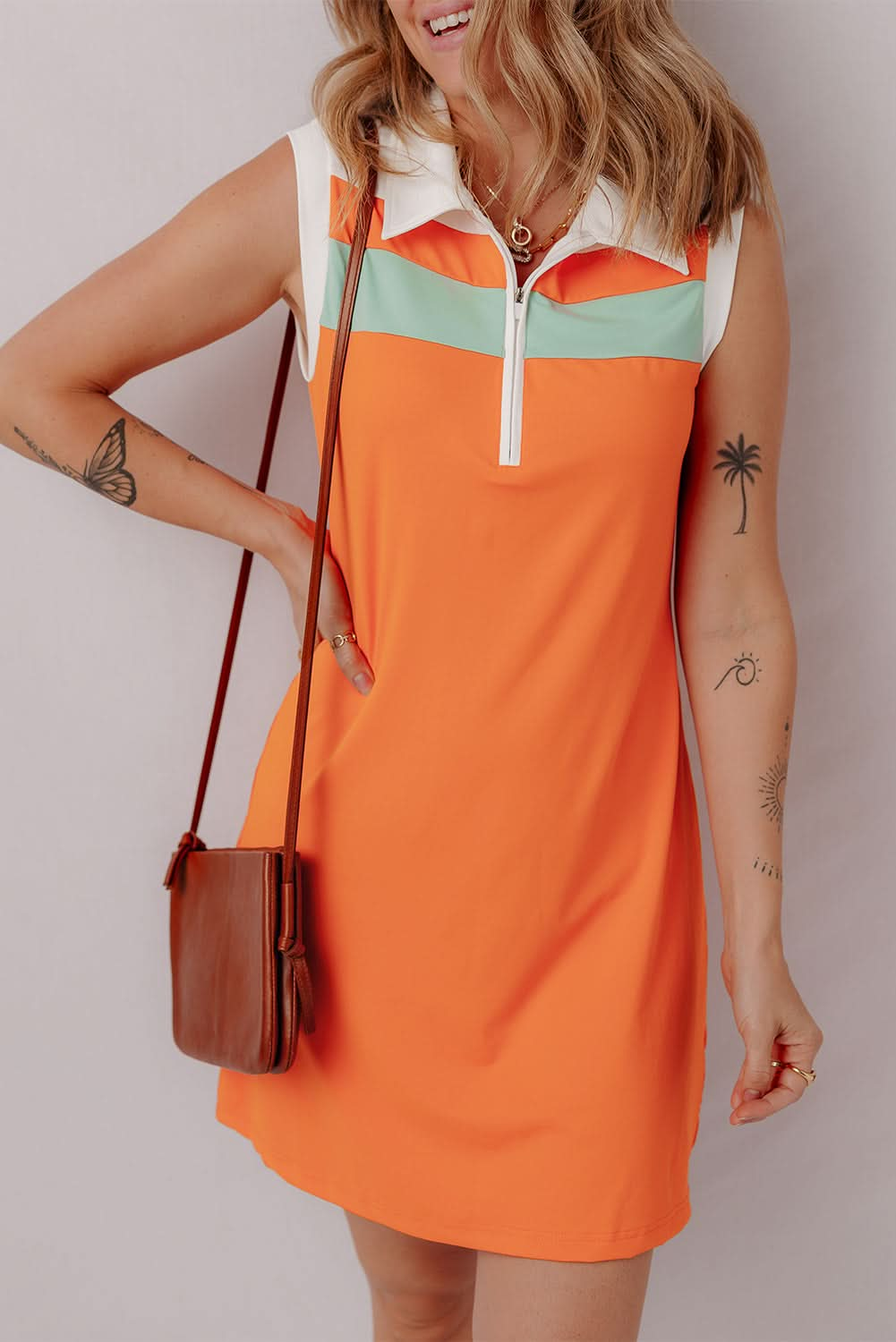 Russet Orange Color-blocked Athletic Mini Dress with Sleeveless Design and Quarter Zip Neckline