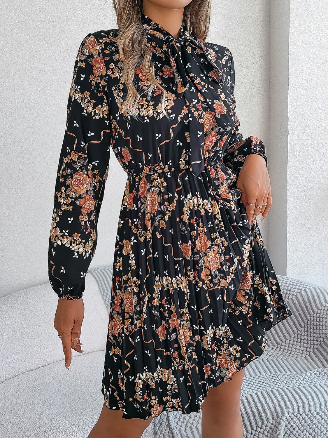 Pleated Printed Tie Neck Long Sleeve Dress.