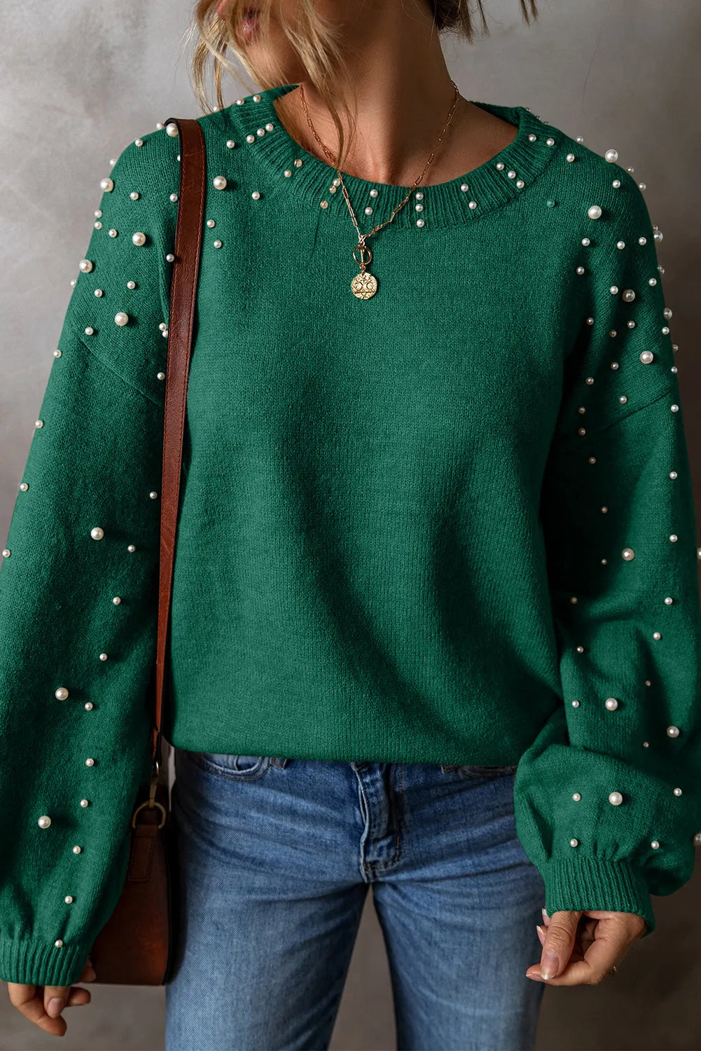 Chic pearl-embellished round neck long sleeve knit sweater