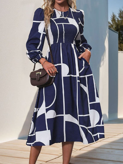 Smocked Color Block Long Sleeve Midi Dress.