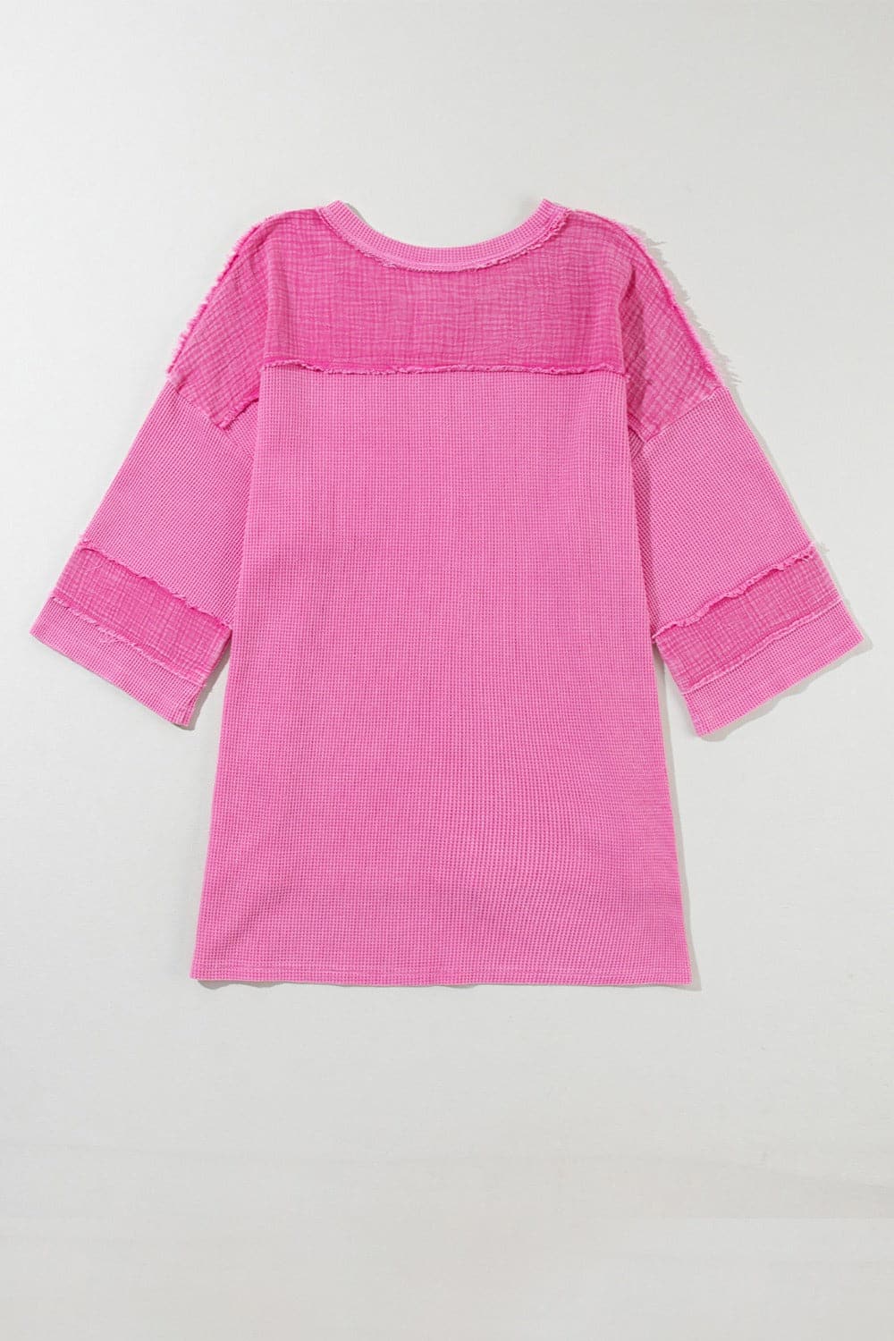 Pocketed Round Neck Three-Quarter Sleeve T-Shirt.