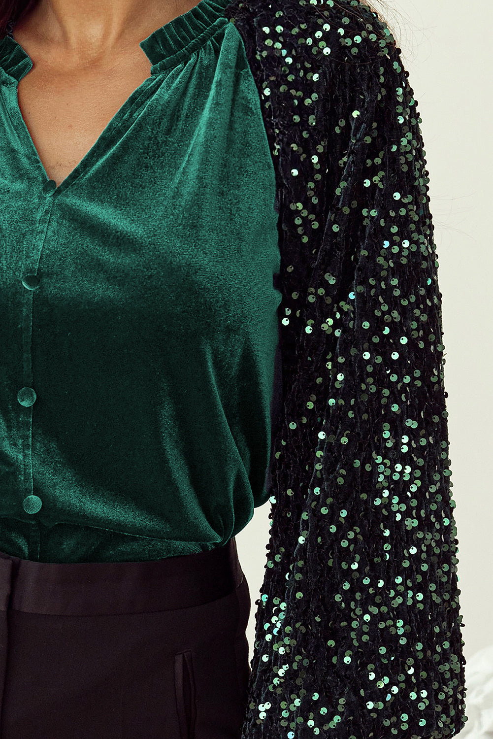 Glamorous velvet top with sequin patchwork sleeves