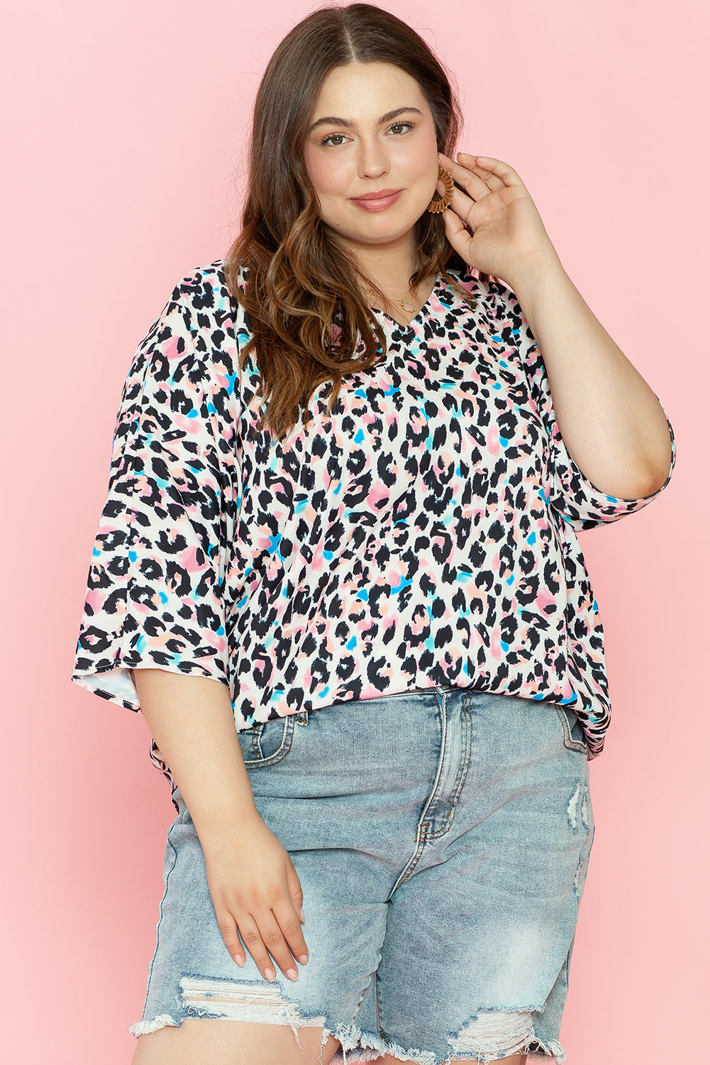 Wild elegance: Brown leopard print plus size batwing top