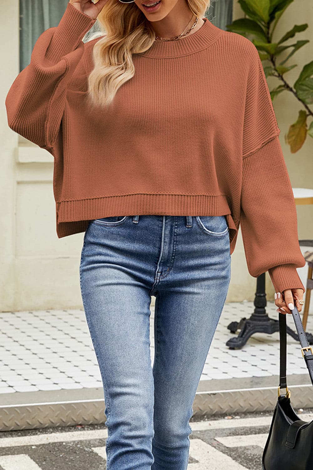 Round Neck Dropped Shoulder Sweater.