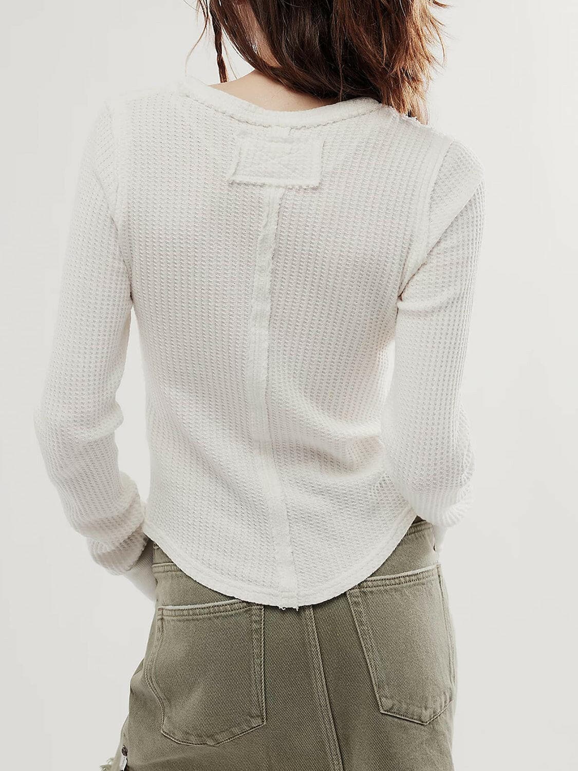 Exposed Seam Round Neck Long Sleeve T-Shirt.