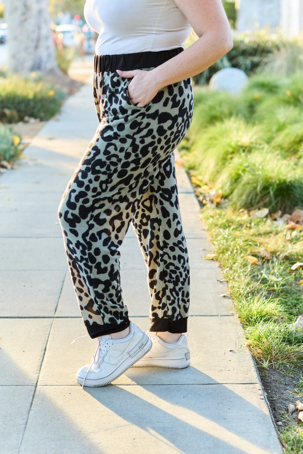 Celeste Design Full Size Leopard Contrast Sweatpants.