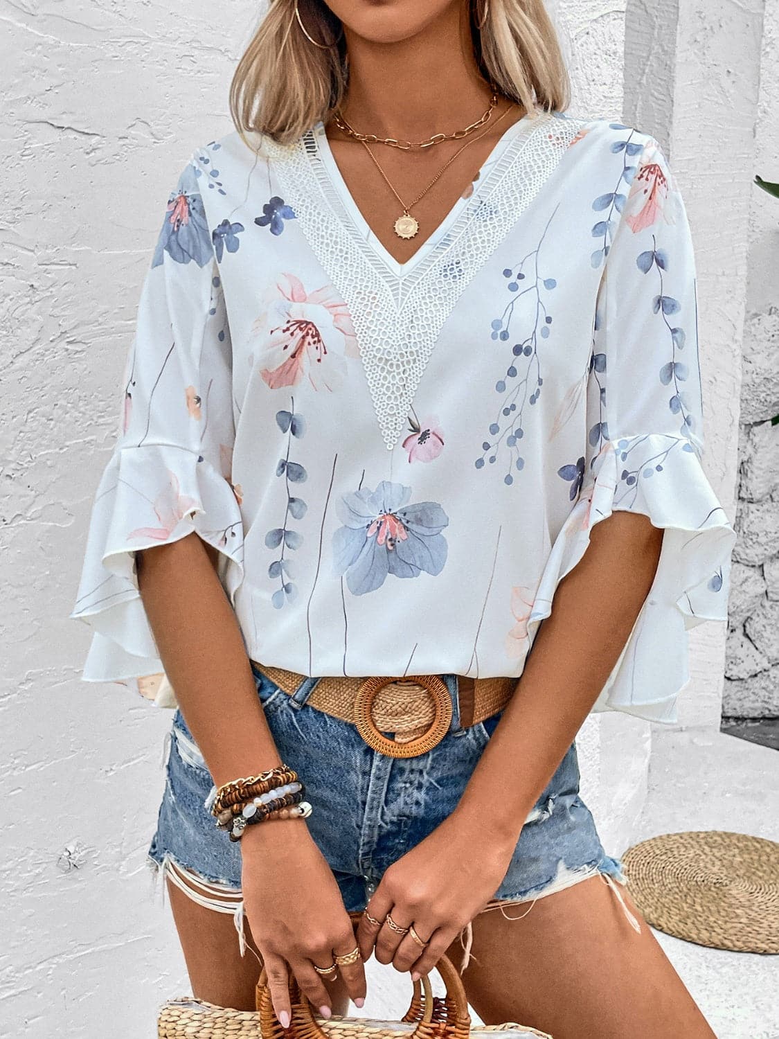 Ruffled Printed V-Neck Half Sleeve Blouse.