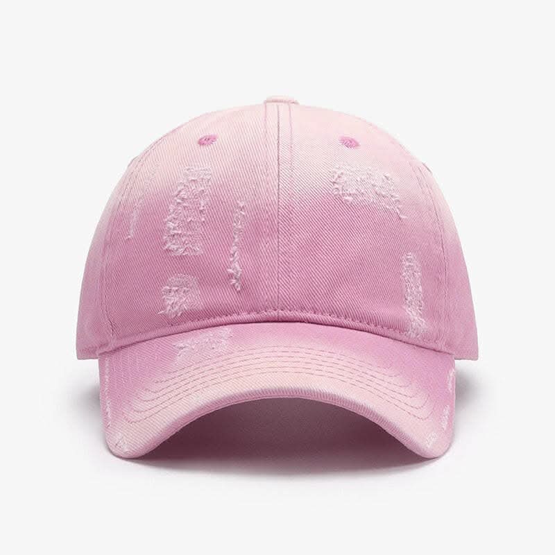 Adjustable cotton baseball cap in pink with a classic design and customizable fit.