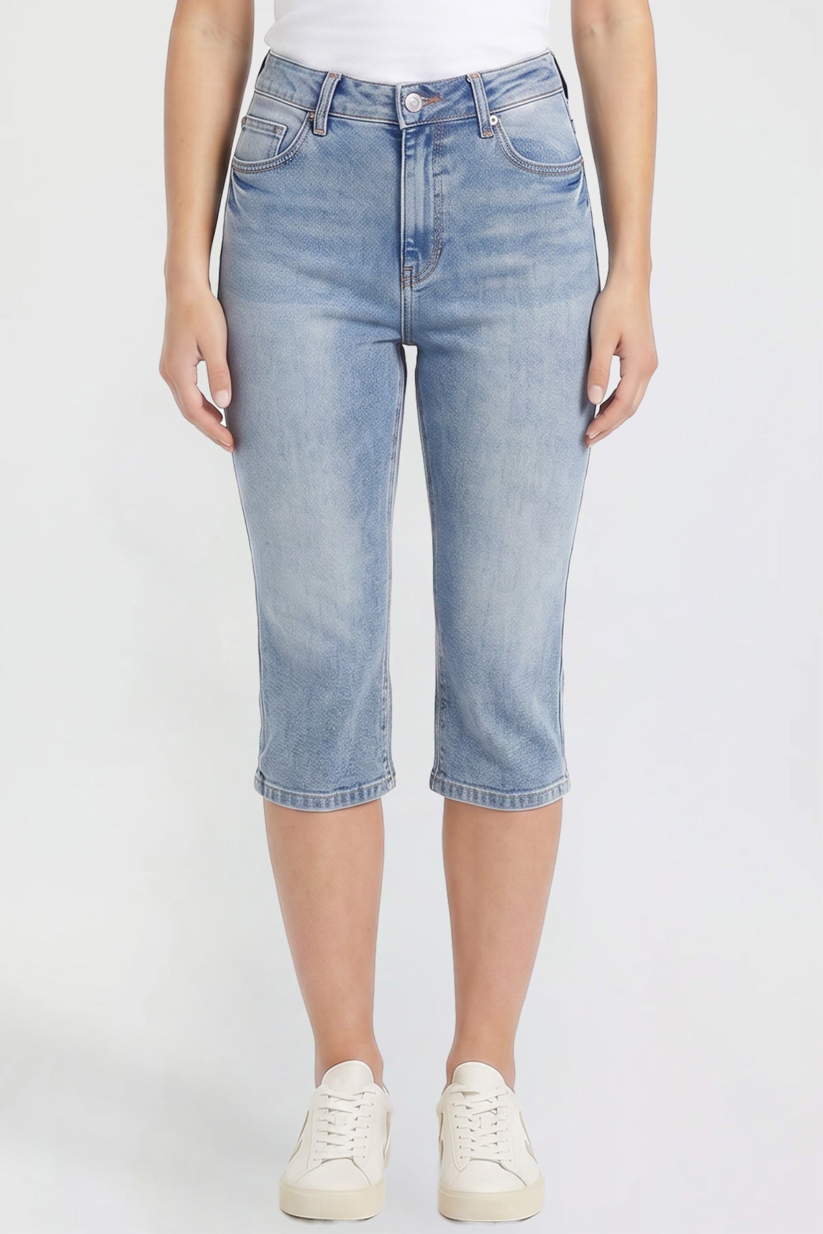 Close-up on the premium stretch fabric and high-rise waistband of the YMI JEANS Luxe Capri pants.