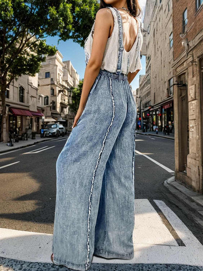 Adjustable strap wide leg denim overalls for modern fashionistas, offering style and comfort in a versatile design.