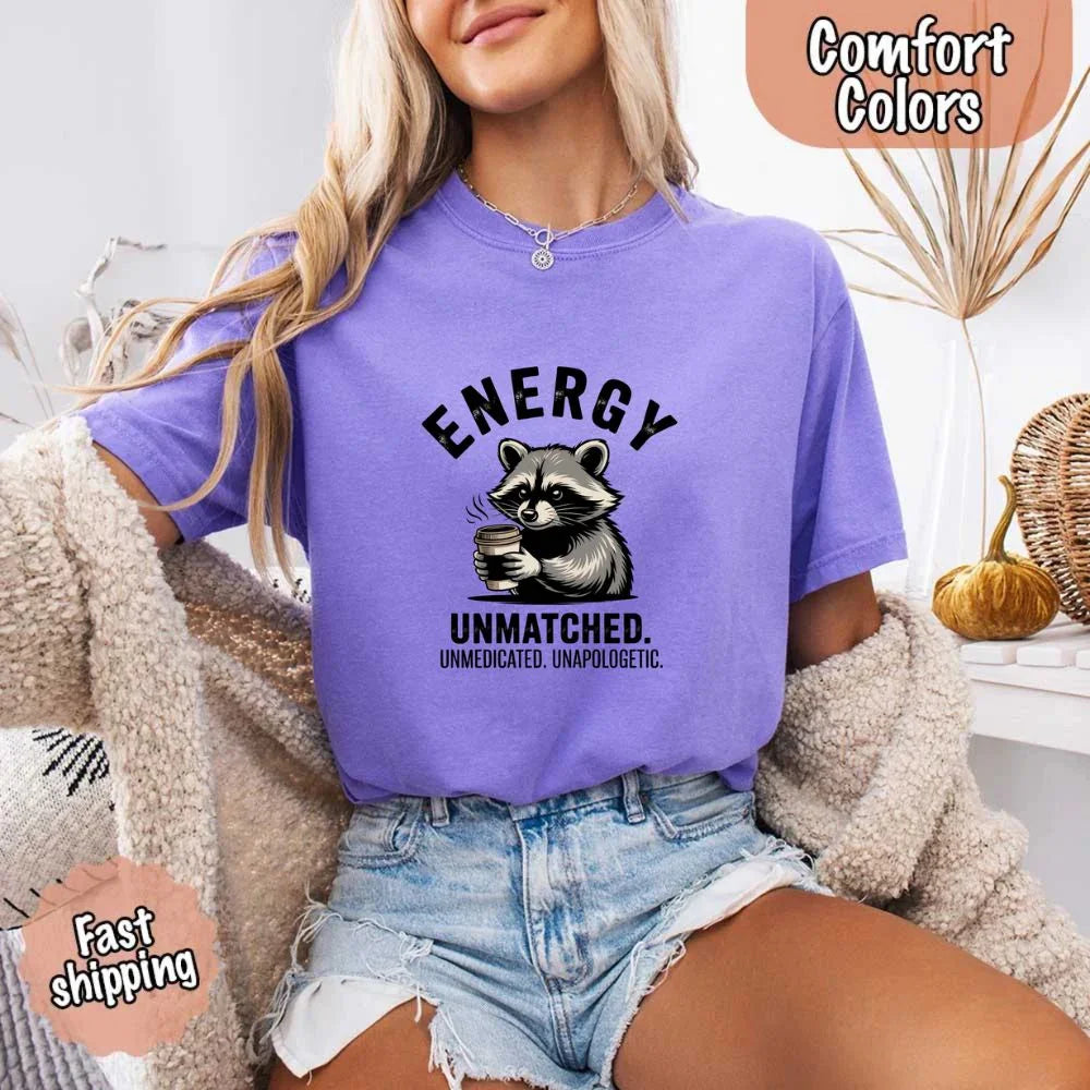 Adorb Custom Tees Comfort Colors Energy Unmatched Raccoon Coffee Funny T-Shirt, a quality graphic tee for coffee lovers.