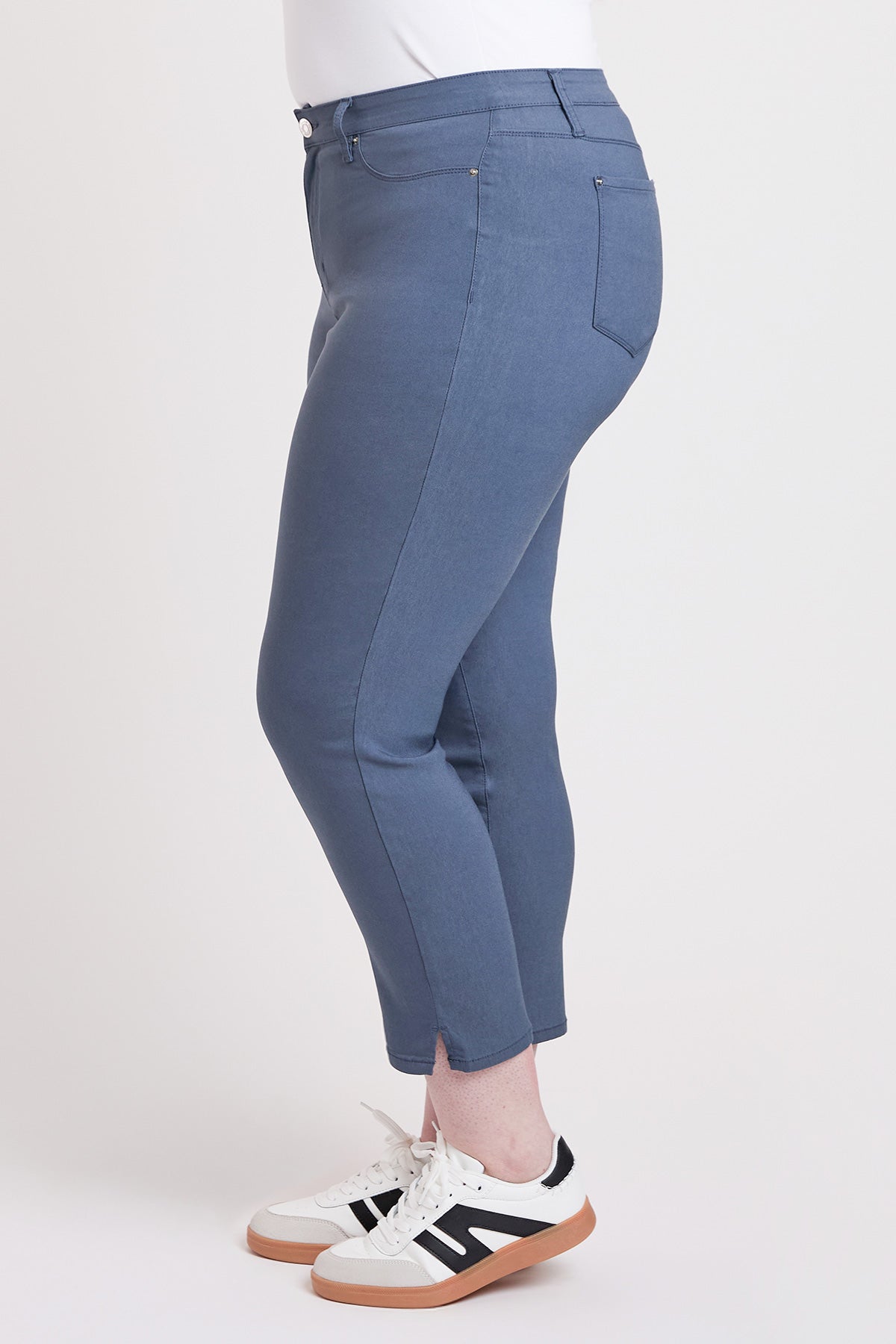 YMI JEANS Women's Plus High Rise Hyperstretch Cropped Straight Pants, folded neatly, emphasizing the compact and travel-frien