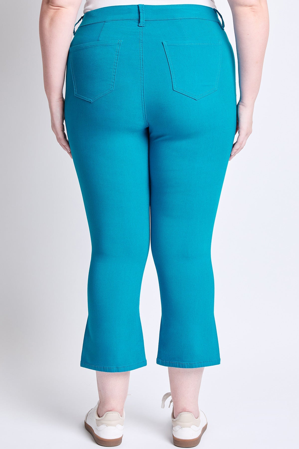 YMI JEANS Plus Size Cropped Kick Flare Pants, highlighting the flattering fit and modern style.