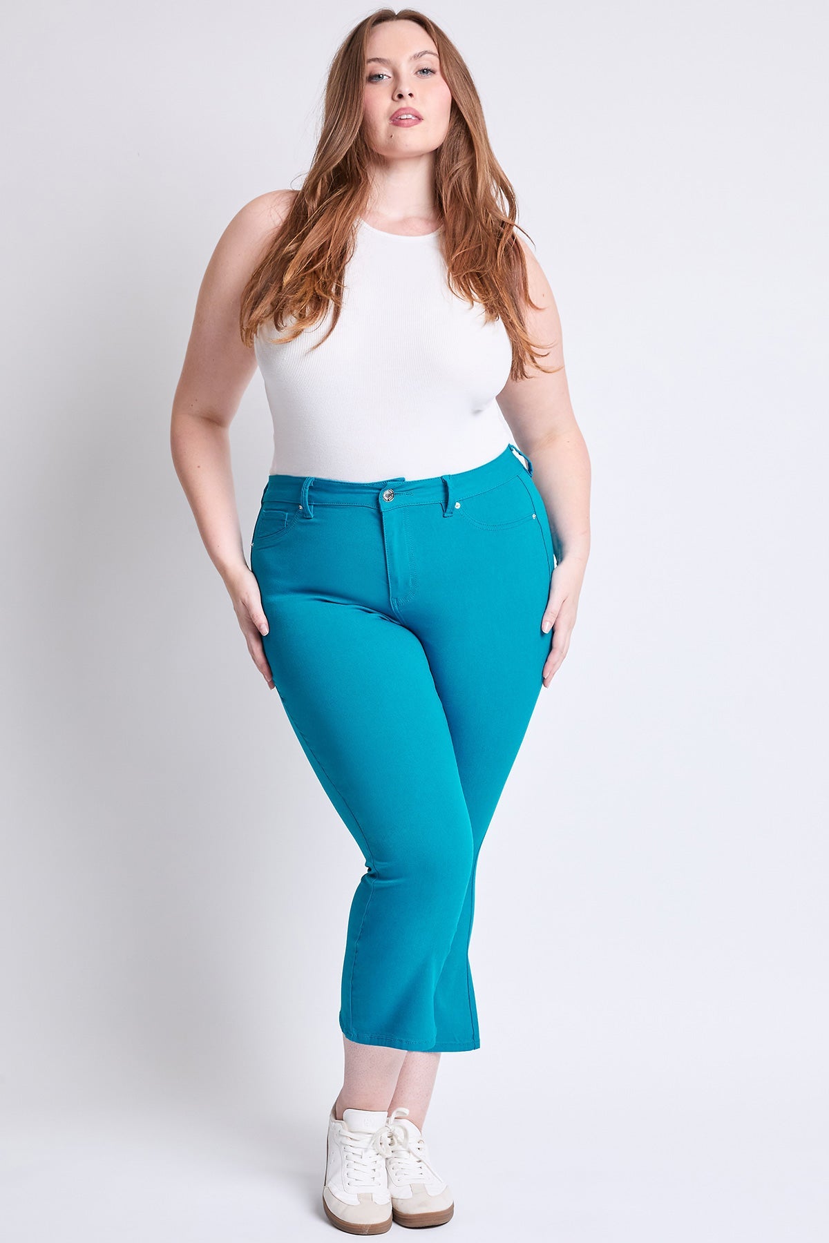 YMI JEANS Women's Plus Cropped Kick Flare Pants, demonstrating the comfortable stretch and movement.