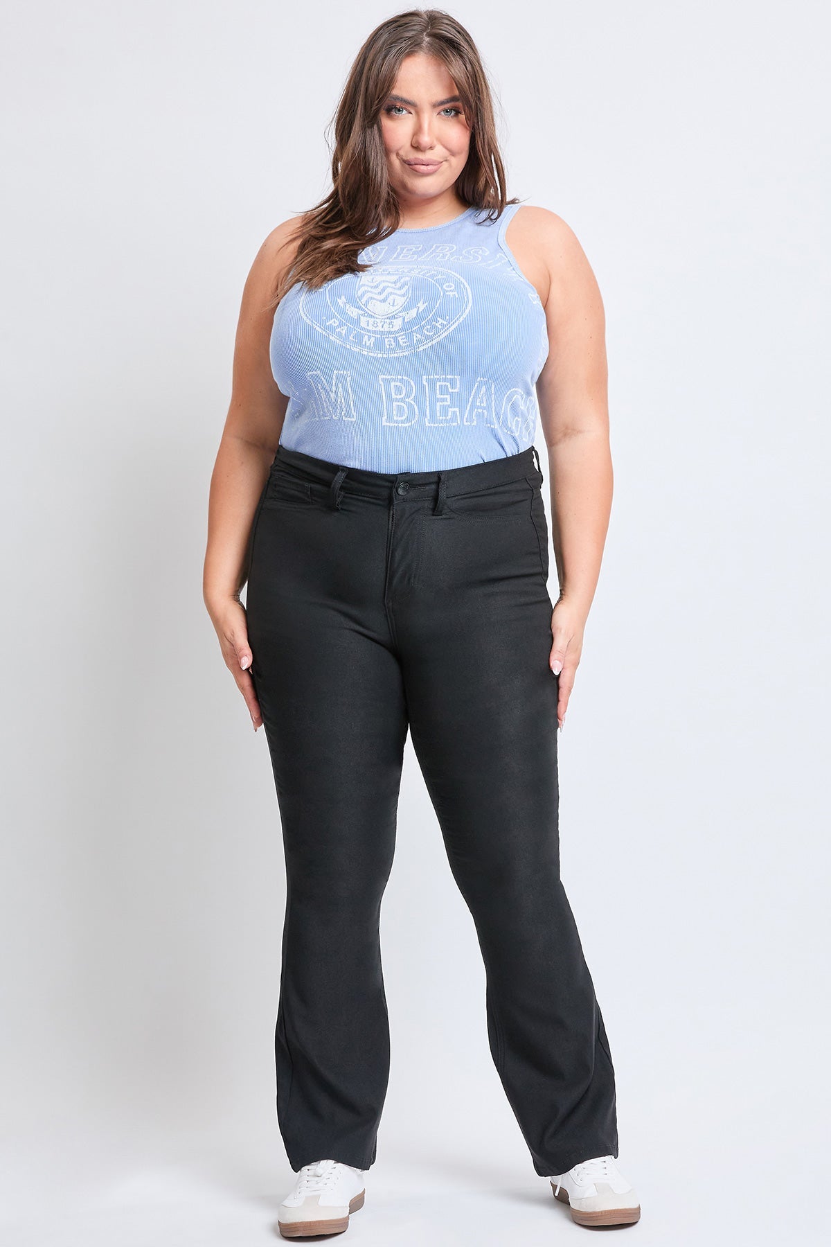 YMI JEANS Women's Plus Hyperstretch Flare Pants modeled, highlighting comfortable fit and stylish flare for everyday wear.