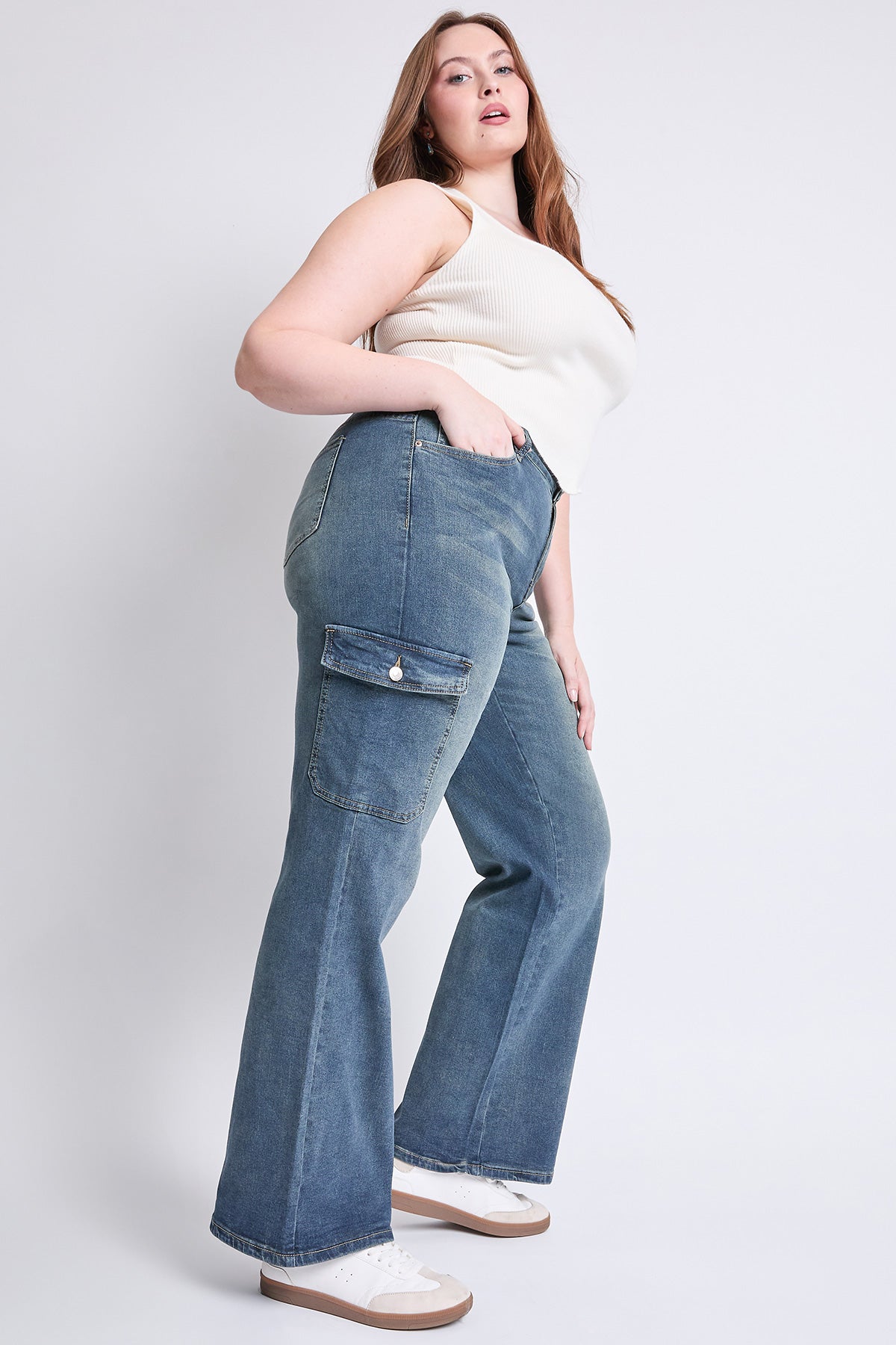 YMI JEANS Women's Plus Skater Cargo Jeans, waistline detail, showing the high rise and sturdy button closure.