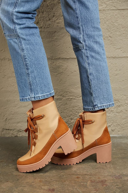 East Lion chic lace-up booties 