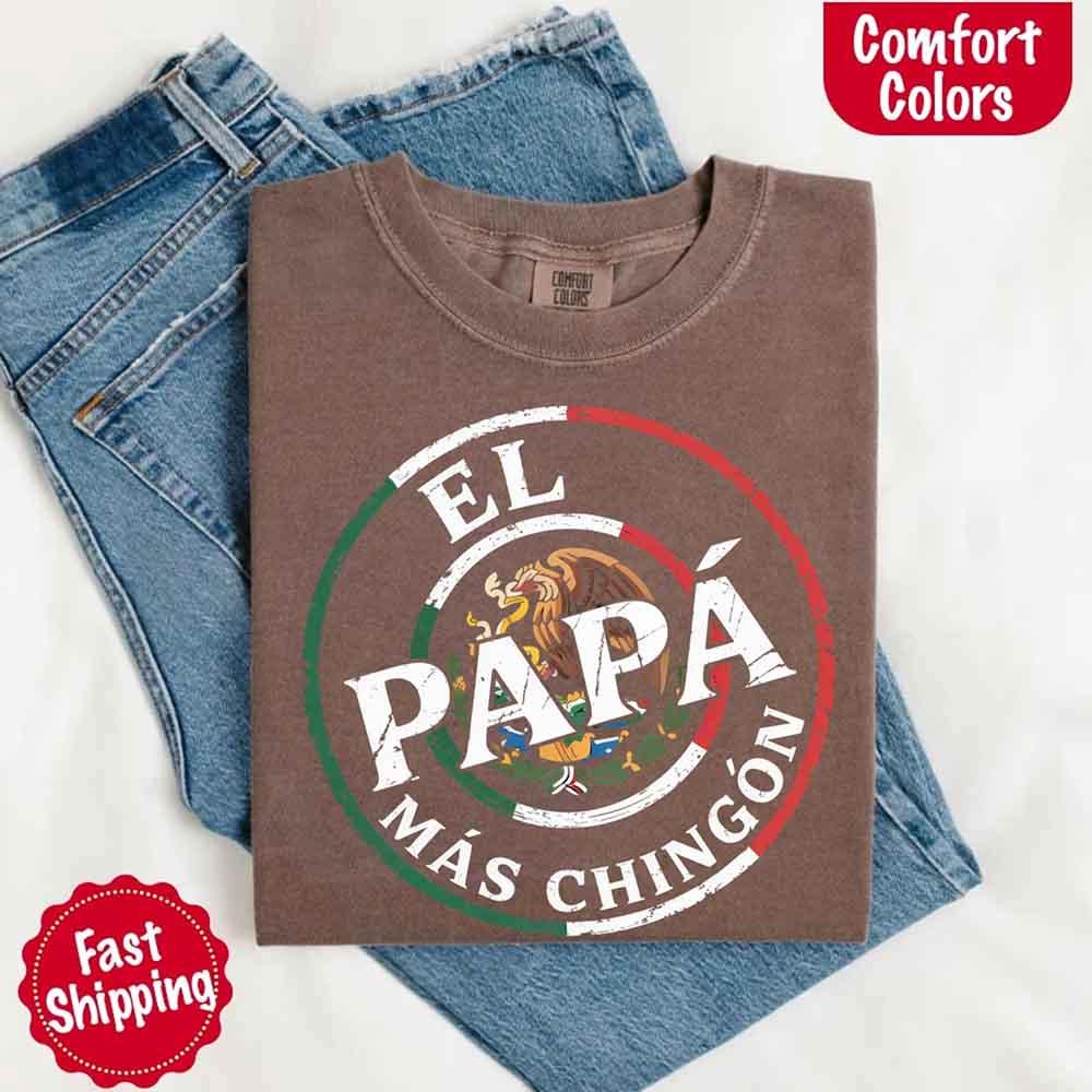 The El Papá Más Chingón t-shirt by Adorb Custom Tees shown in a variety of available vintage-inspired color options.