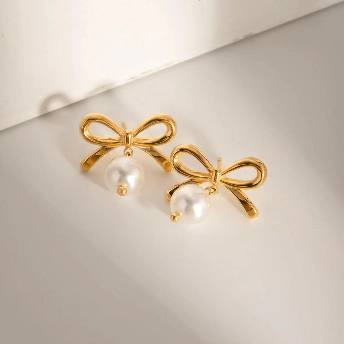 Elegant pearl bow earrings - Love Salve 