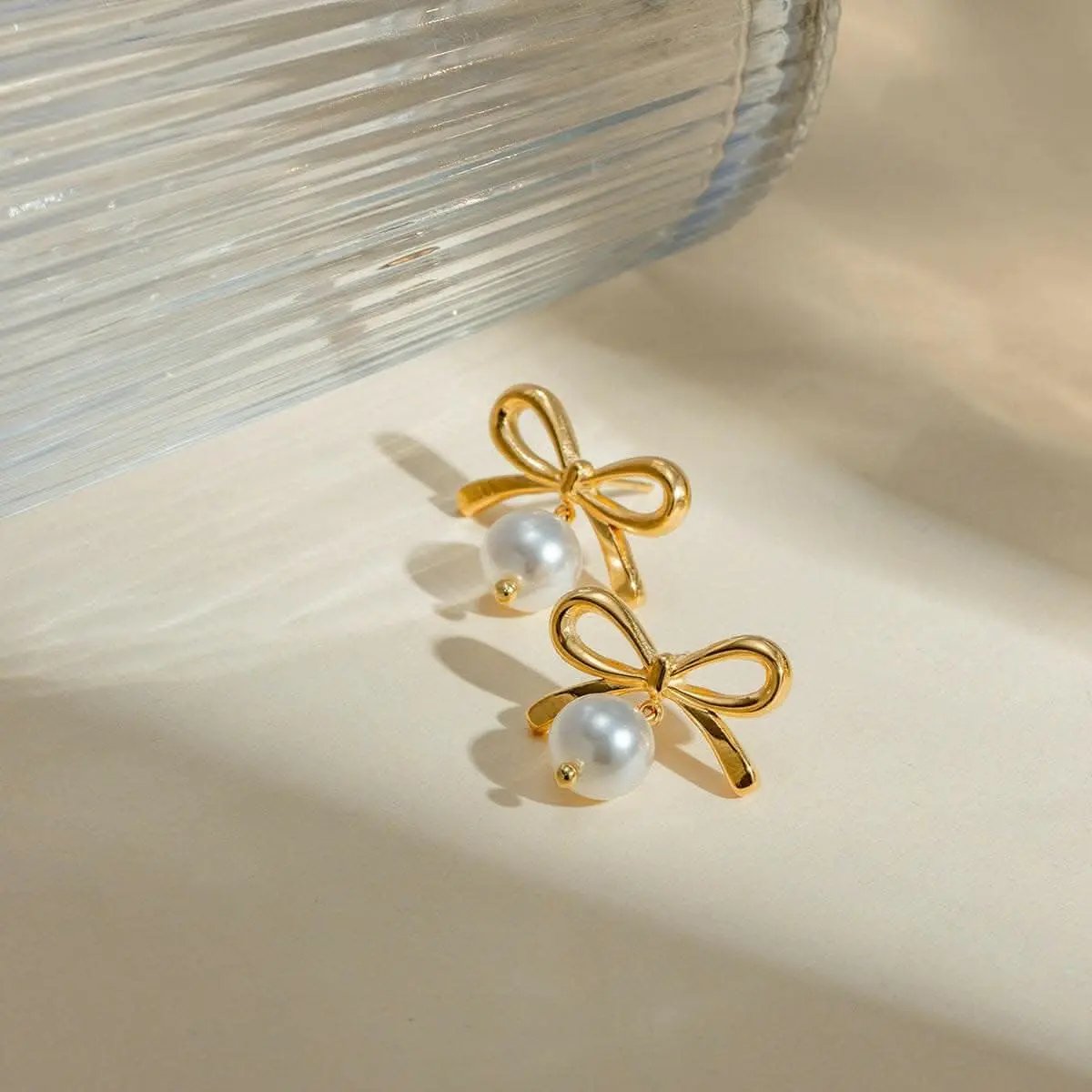 Elegant pearl bow earrings - Love Salve 