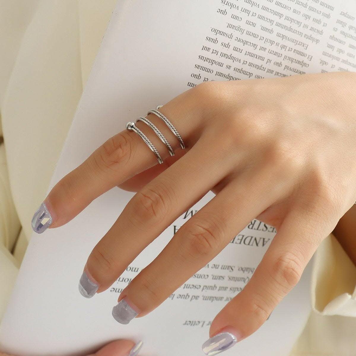 Elegant titanium steel wrap ring 