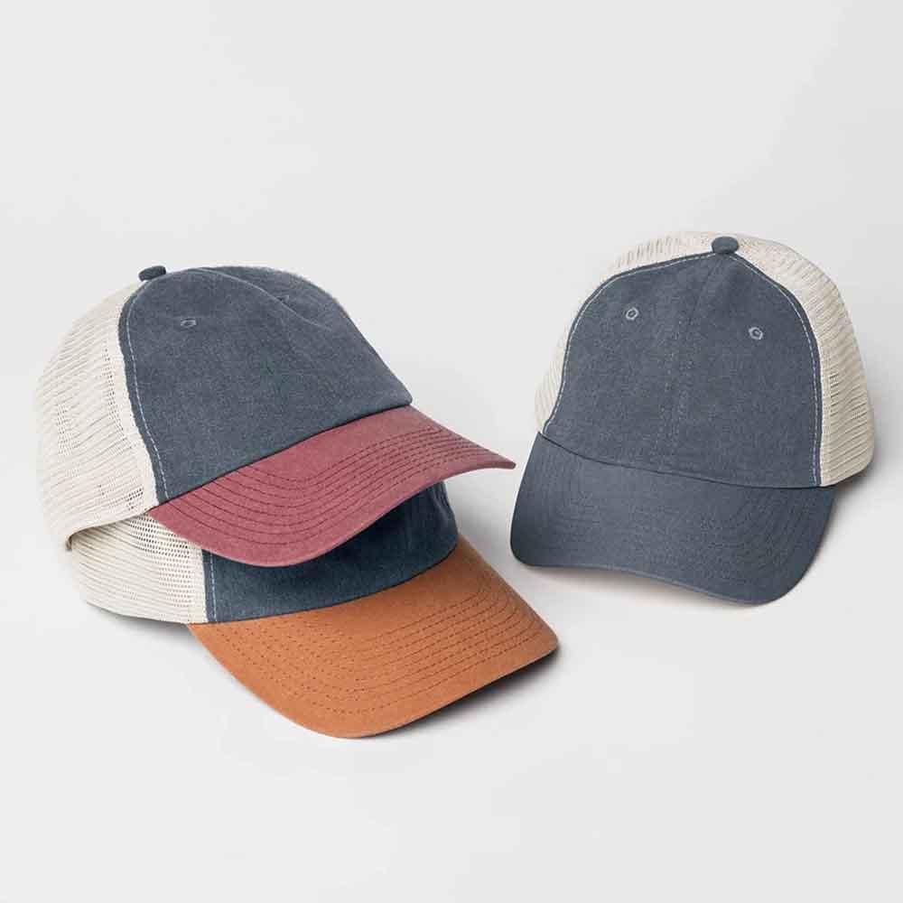 Back view of the Adorb.co Pigment-Dyed Trucker Hat, featuring its breathable mesh and adjustable strap for a comfortable, qua