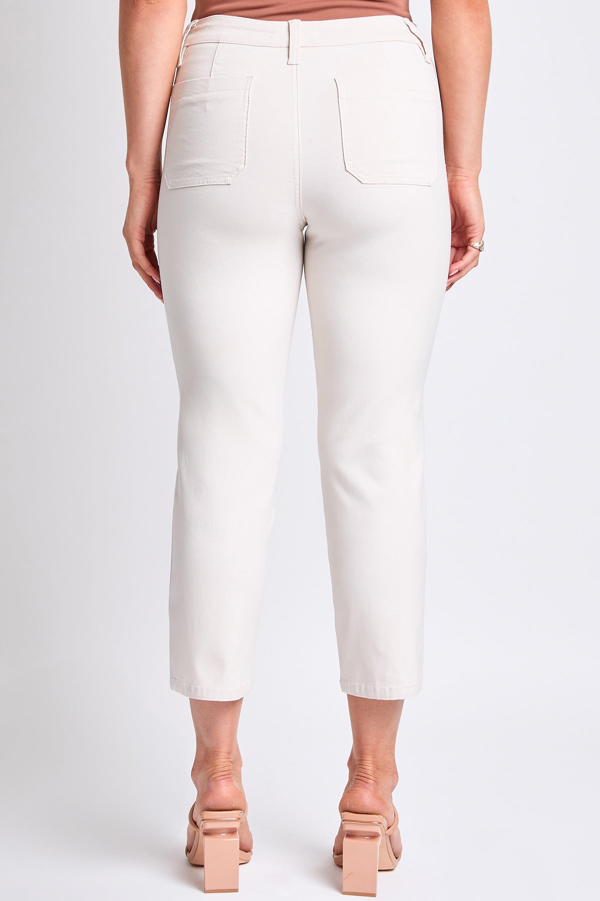 Back view of YMI JEANS Women's Hyperstretch Crop Straight Pants, featuring functional pockets and a smooth silhouette.