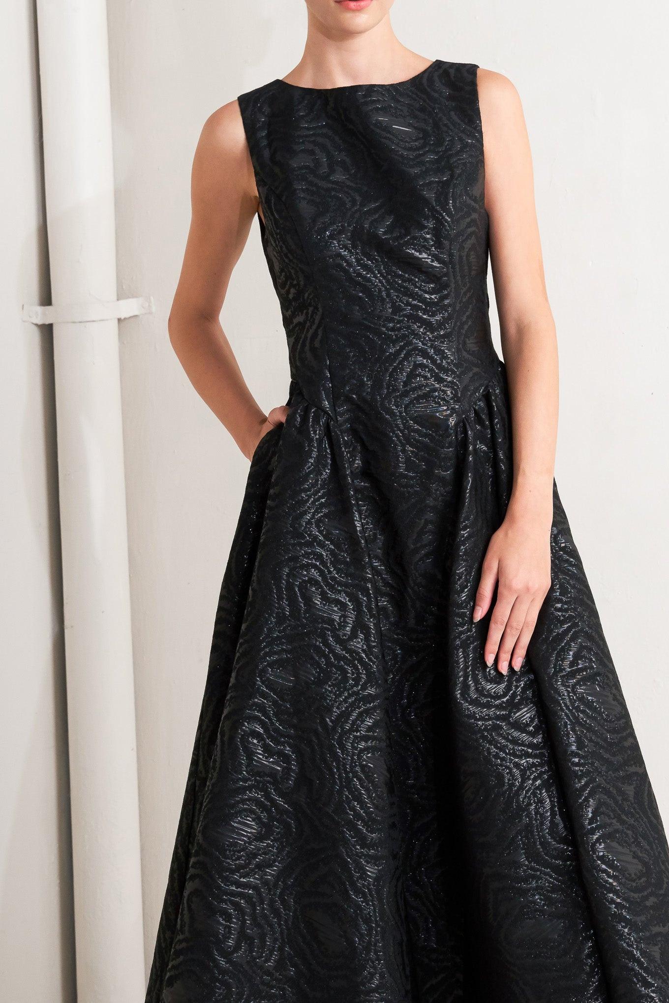Back view of the Flying Tomato CHECK YOURSELF black woven midi dress, highlighting its versatile and modern appeal.