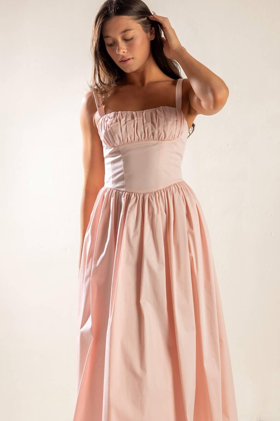 Flying Tomato Easily Loved Woven Midi Dress worn in a natural setting, demonstrating its effortless style and comfort.