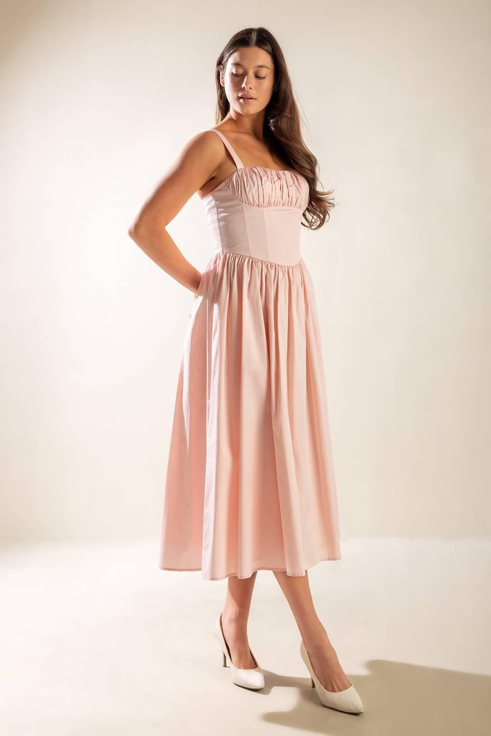 Back view of the Flying Tomato Easily Loved Woven Midi Dress, highlighting its graceful drape and elegant silhouette.