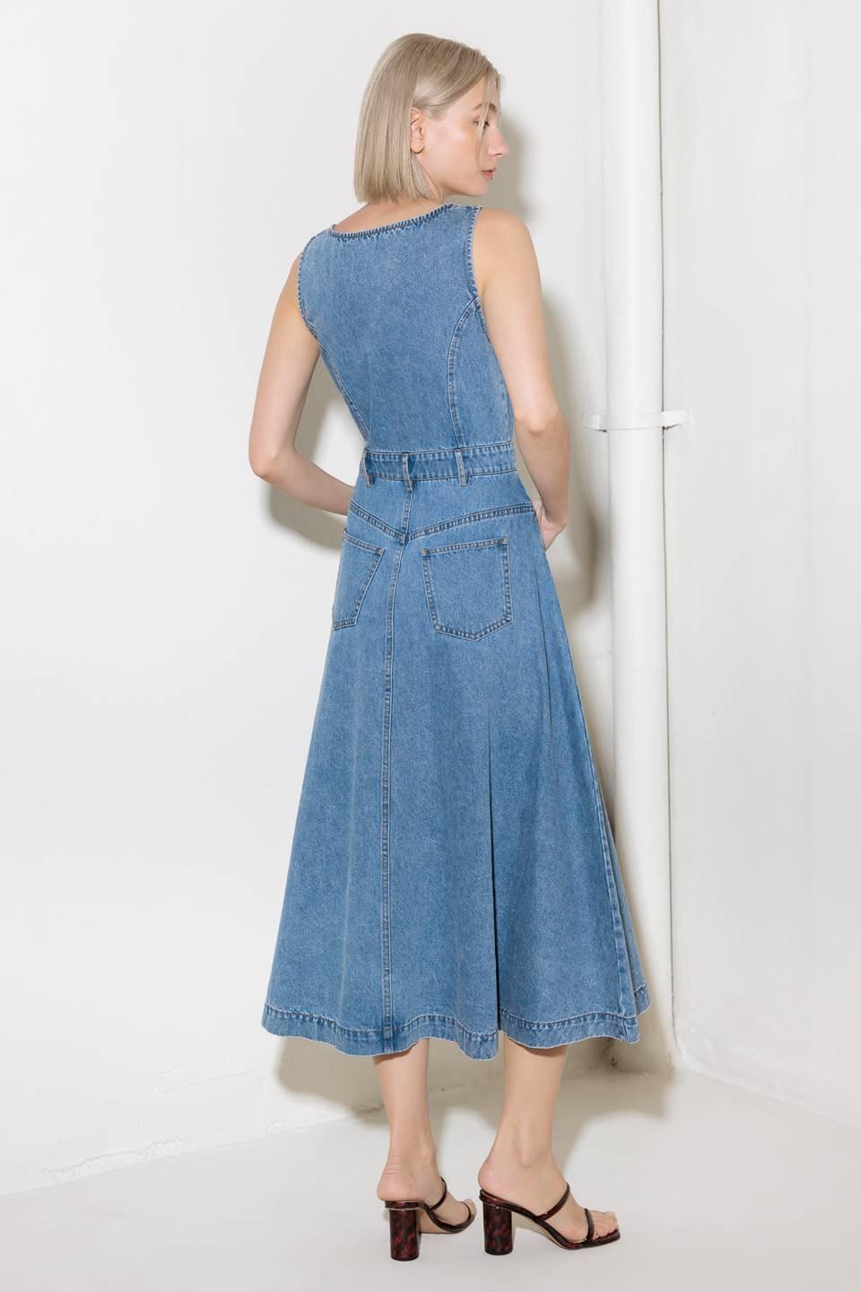 Detail shot of the Flying Tomato Softly Romantic Denim Midi Dress, highlighting the unique sleeve design and the quality craf