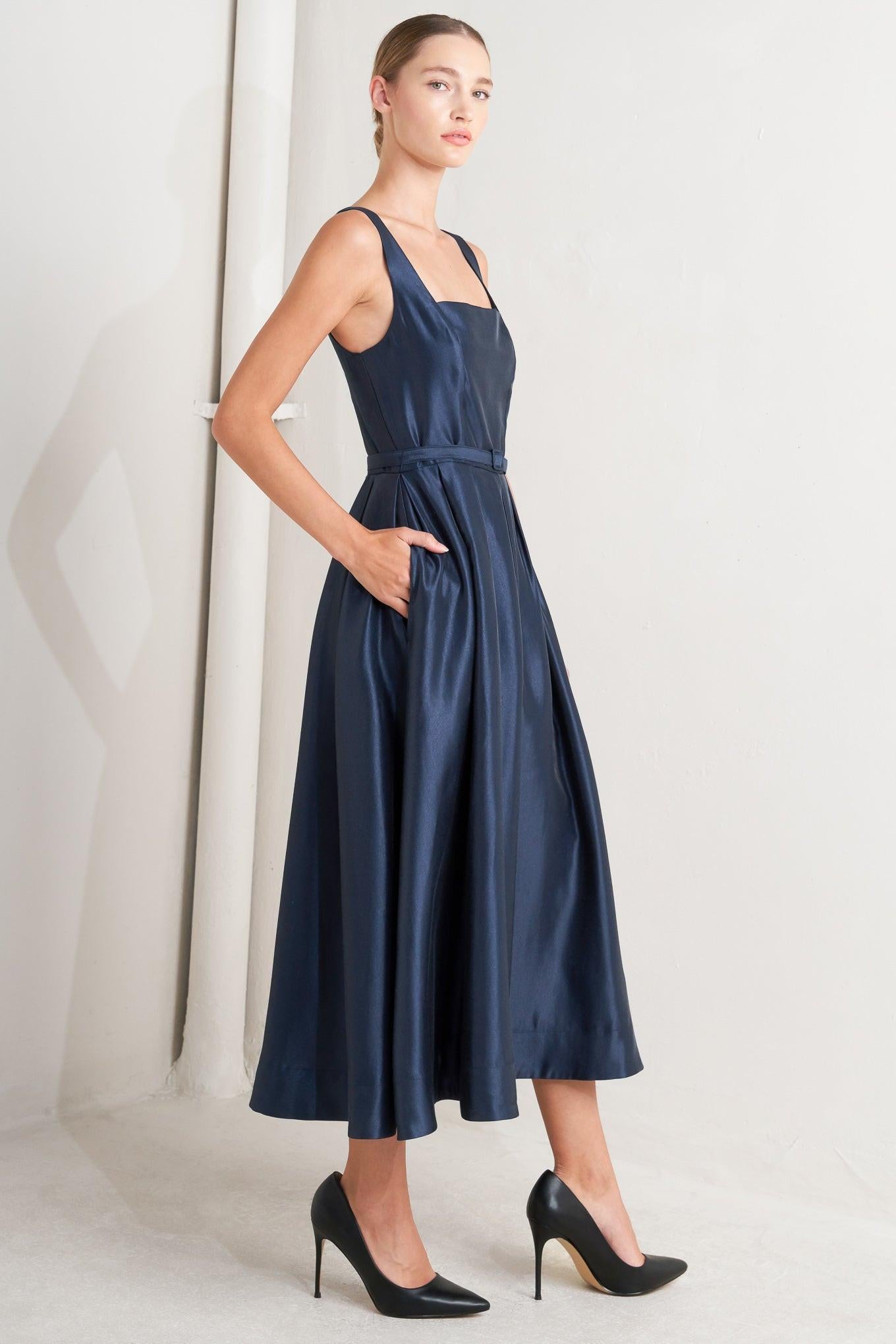 Detail shot of the Flying Tomato Femme Silhouette Woven Midi Dress's premium woven fabric and quality stitching.