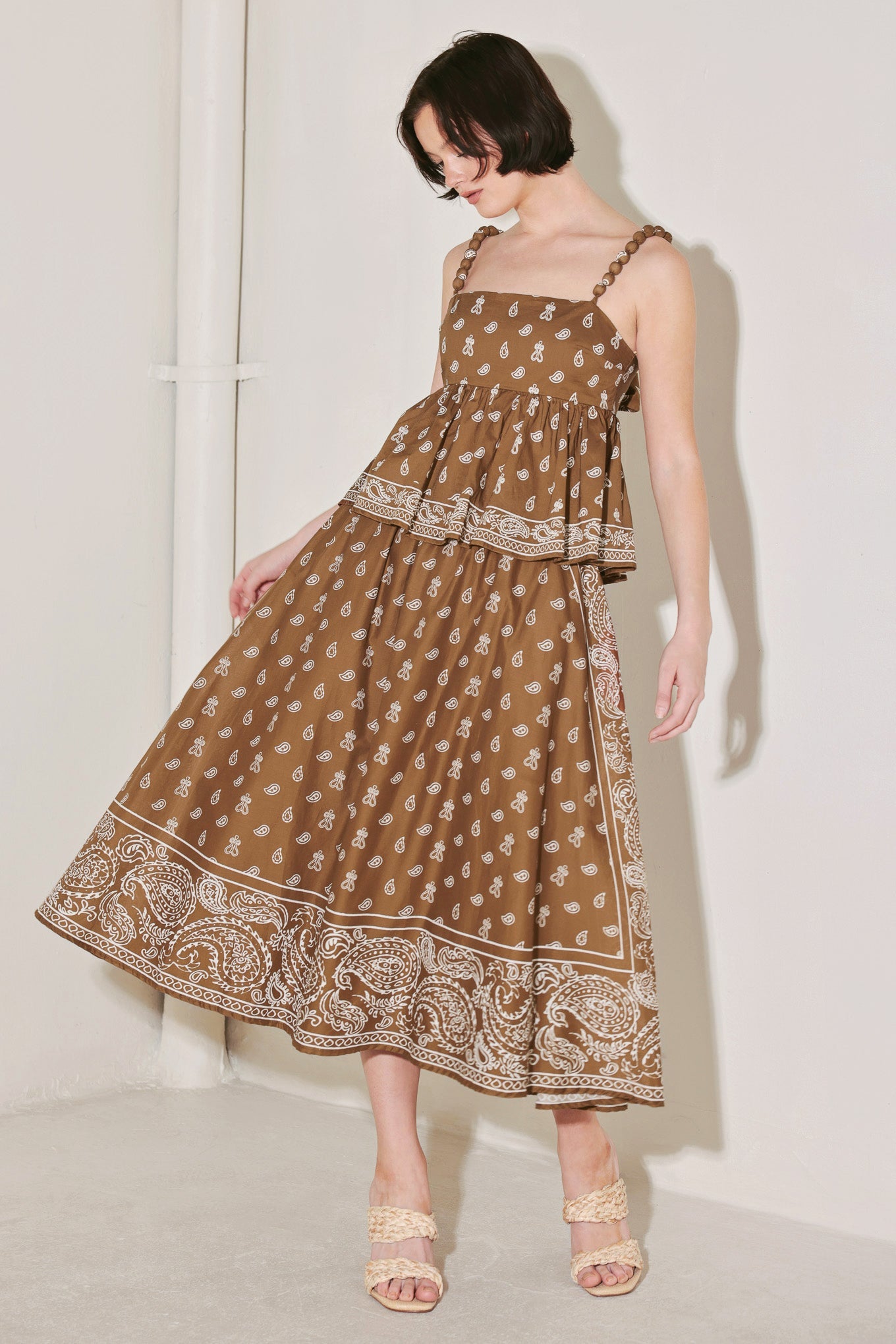 Extreme close-up of the vibrant woven fabric texture of the Flying Tomato THE MORE THE MERRIER full midi skirt, rich in detail.